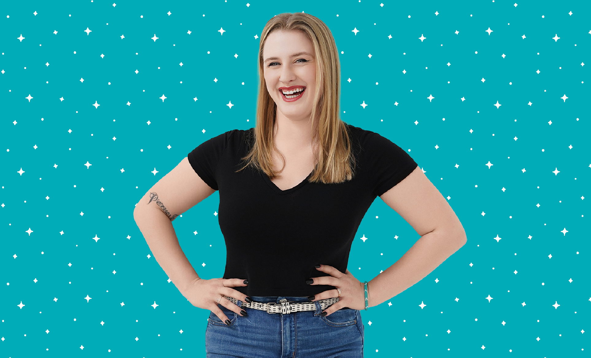 Photo of madi balman standing in the middle of the photo with a black shirt and blue jeans on background of photo is a teal star pattern